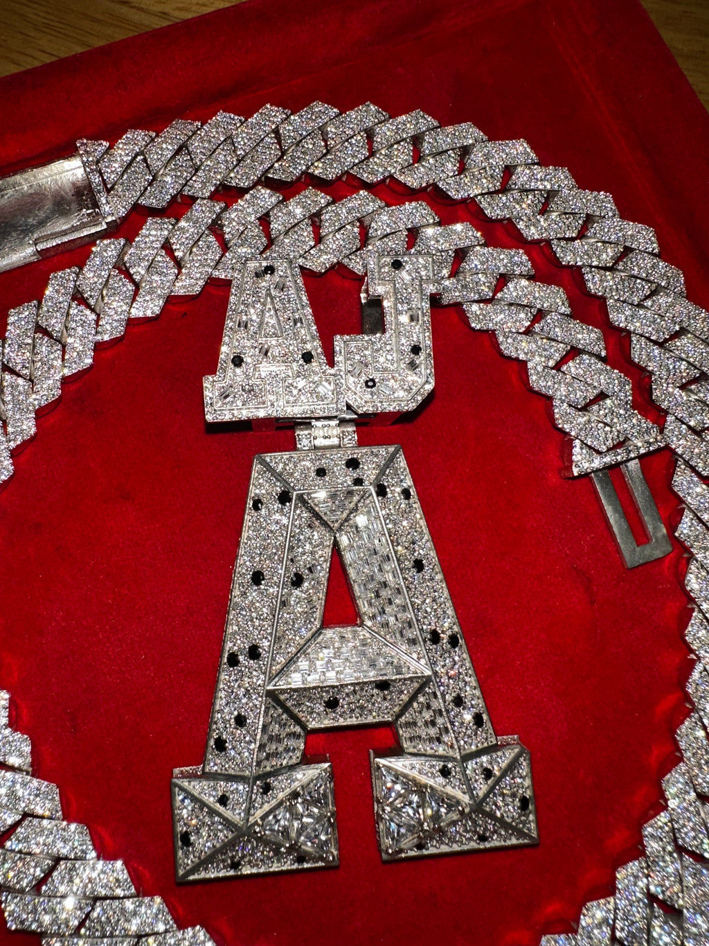 This stunning fully iced-out custom “AJ-A” pendant is crafted with premium detailing and a luxury finish Perfect hip-hop jewelry, rappers