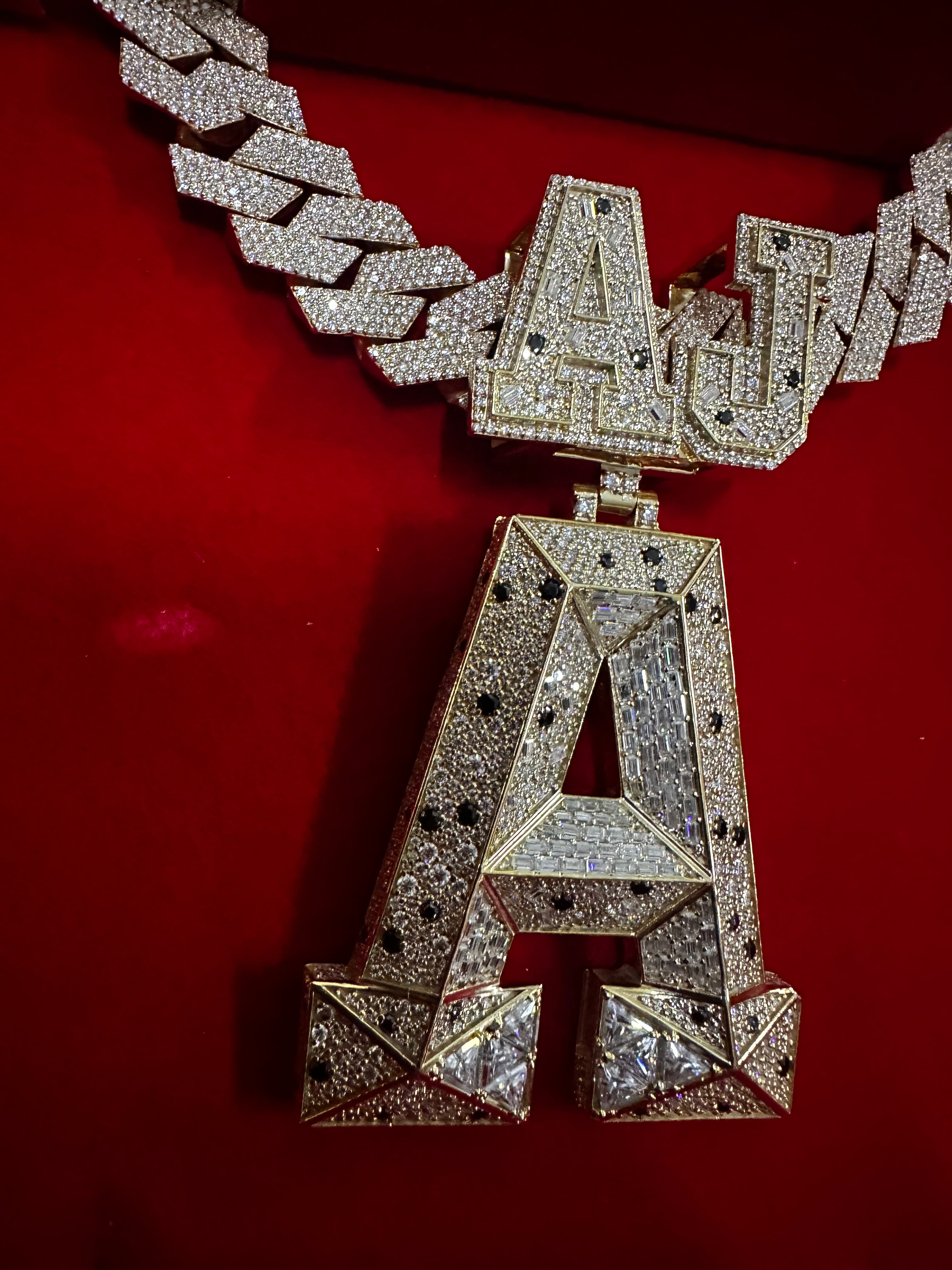 This stunning fully iced-out custom “AJ-A” pendant is crafted with premium detailing and a luxury finish Perfect hip-hop jewelry, rappers