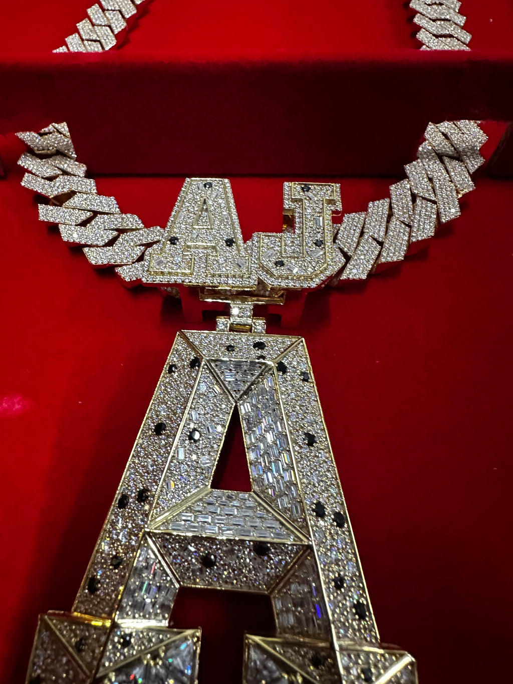 This stunning fully iced-out custom “AJ-A” pendant is crafted with premium detailing and a luxury finish Perfect hip-hop jewelry, rappers