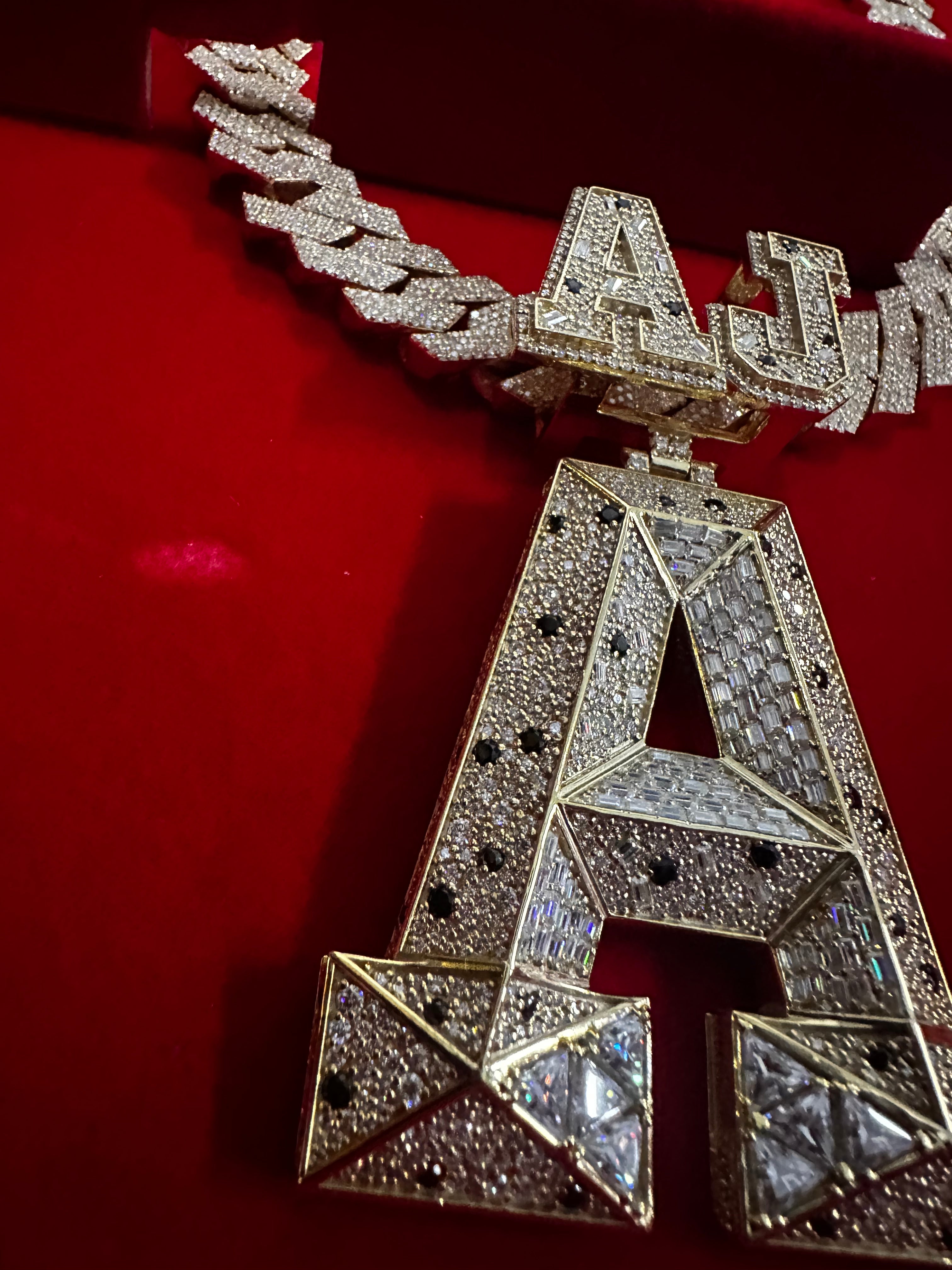 This stunning fully iced-out custom “AJ-A” pendant is crafted with premium detailing and a luxury finish Perfect hip-hop jewelry, rappers