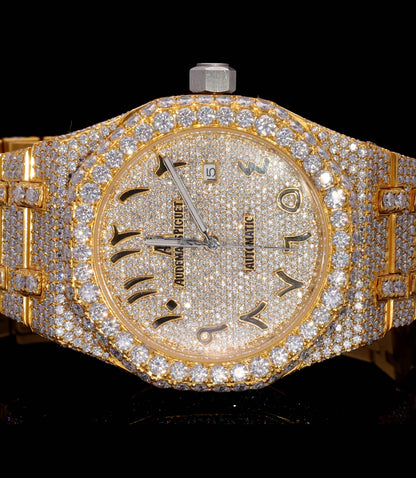 Luxury 18K Yellow Gold Plated iced-out watch featuring D Color VVS Moissanite stones, champagne diamond-paved dial, and available with Japanese Automatic, Semi ETA Automatic, or ETA Automatic movement.