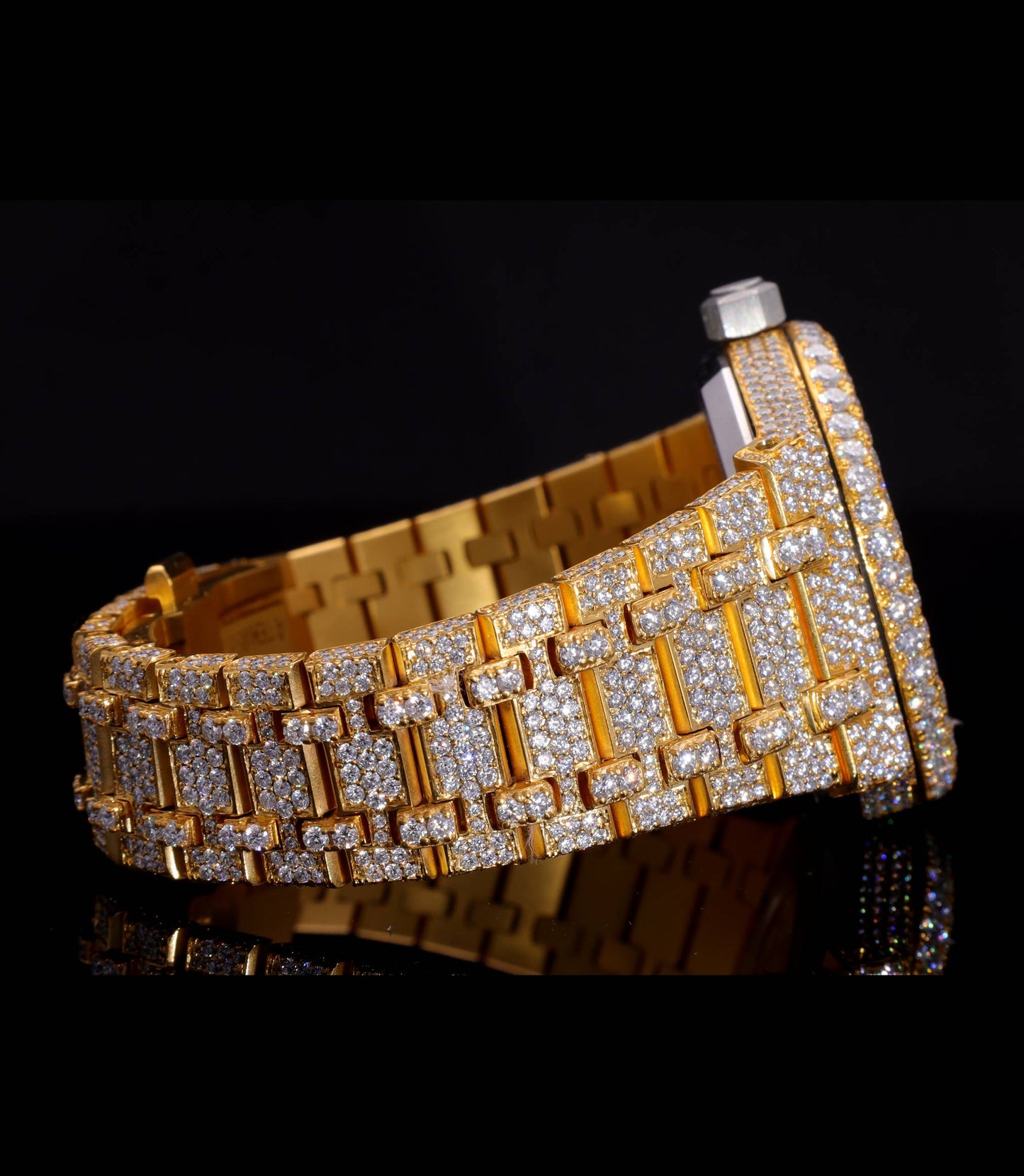 Luxury 18K Yellow Gold Plated iced-out watch featuring D Color VVS Moissanite stones, champagne diamond-paved dial, and available with Japanese Automatic, Semi ETA Automatic, or ETA Automatic movement.